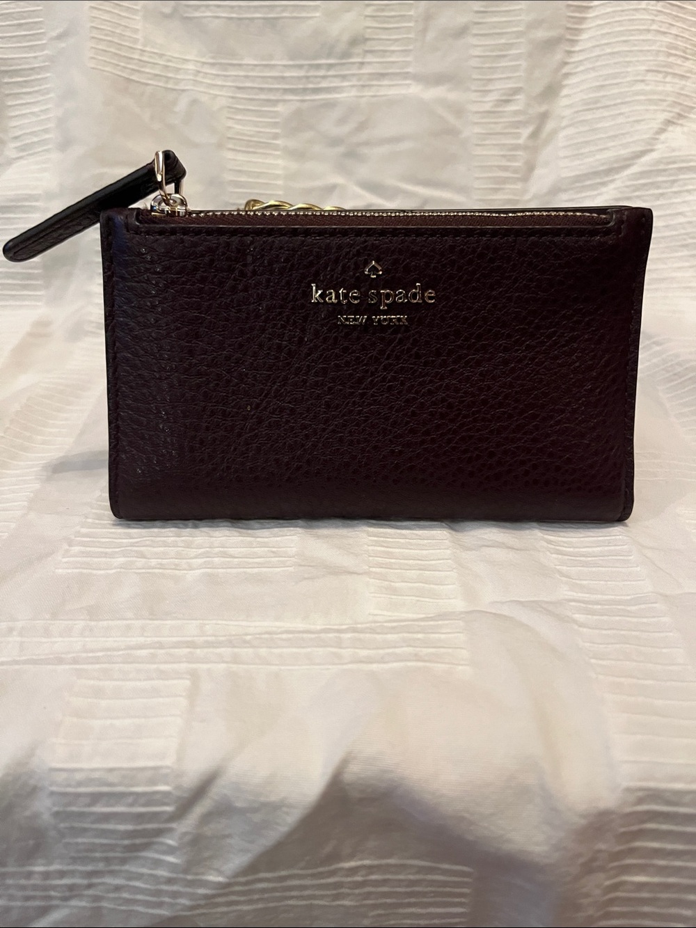 kate spade pebbled leather wallet dark brown with gold logo
